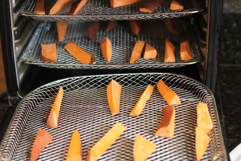 sweet potatoes, vegan sweet potatoes, vegan diet, plant based diet, roasted sweet potatoes, health benefits of sweet potatoes, sweet potato benefits for your health, plant based foods, plant based recipes, air fryer sweet potatoes, protein rich vegetables, sweet potato, fiber foods, vegan family foods, family friendly foods, promotes gut health, sweet potato dishes
