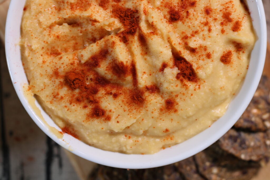 This vegan and plant based hummus is oil free and easy to make. it goes great as a dip for vegetables or as a spread on your favorite wrap or sandwich. 