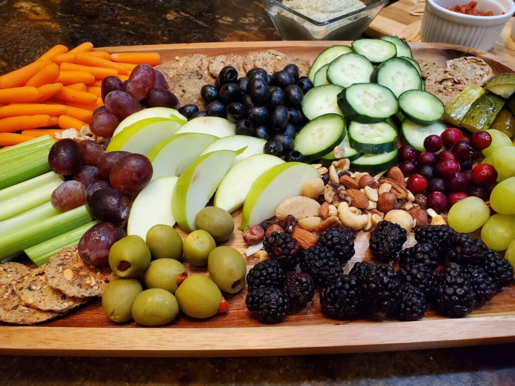 charcuterie vegan, vegan charcuterie board ideas, vegan charcuterie recipe, best vegan charcuterie, vegan charcuterie, vegan snack board, hummus charcuterie board, charcuterie board, christmas charcuterie board, whole foods charcuterie board, vegan snack board, plant based snack board, how to make a vegan charcuterie board, how to make a plant based charcuterie board, game night snacks, healthy vegan kids snacks, healthy plant based kids snacks, kid friendly vegan food